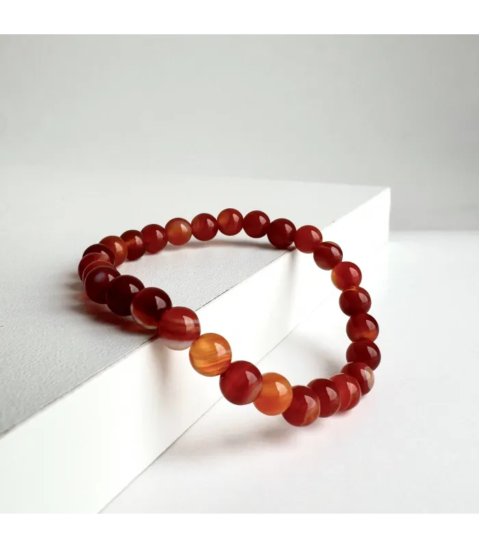PULSERA BOLITAS CORNALINA
