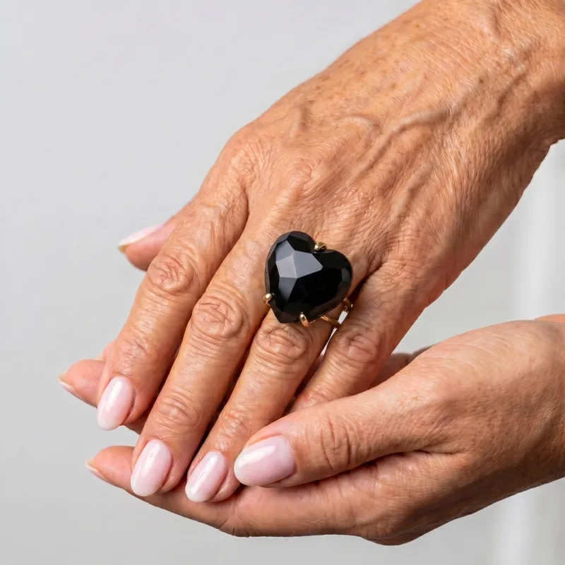 ANILLO CURVED HEART FACETADO - ONIX